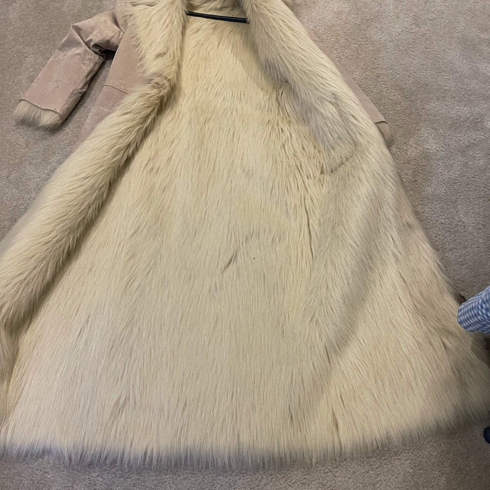 Only worn a few times!Closes with single hook.Suede with faux fur inside.